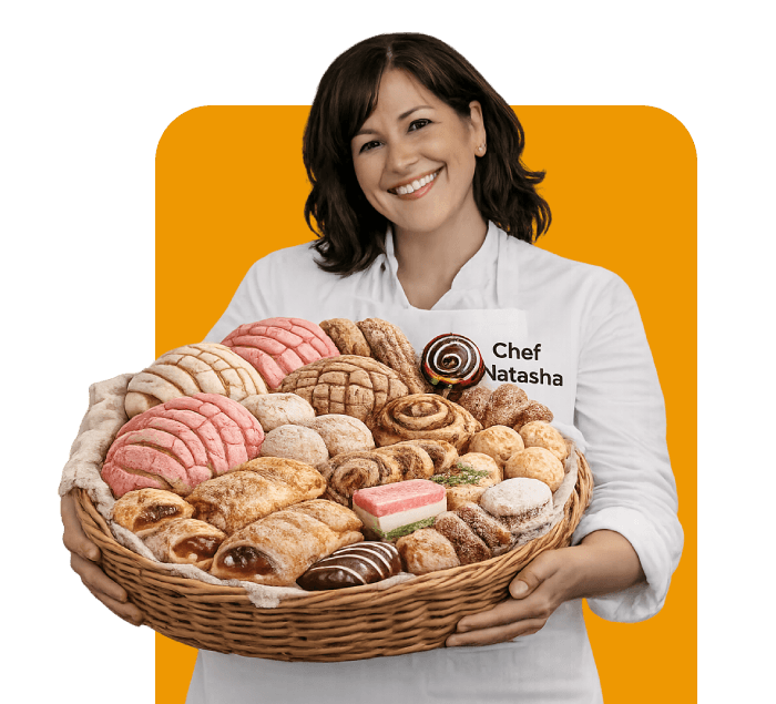 Chef Natasha sorrindo enquanto segura uma cesta cheia de pães e doces sem farinha e sem açúcar